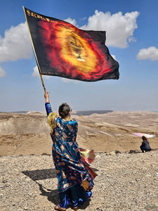 Sacred Fire Lion of Judah silk worship flag raised in worship over the Negev desert in Israel